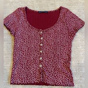 Button up red shirt with white flowers